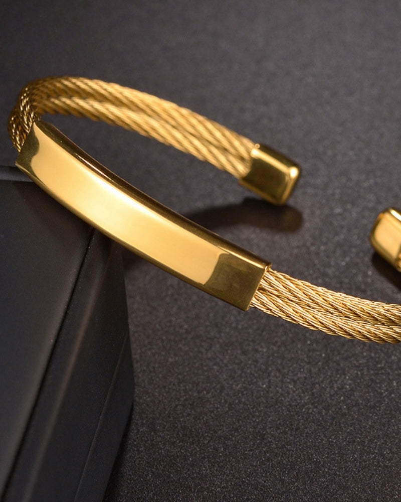 Bold Industrial Torque Cable Cuff Bracelet - Polished Gold-Tone Twisted Steel Style