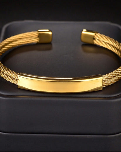 Bold Industrial Torque Cable Cuff Bracelet - Polished Gold-Tone Twisted Steel Style