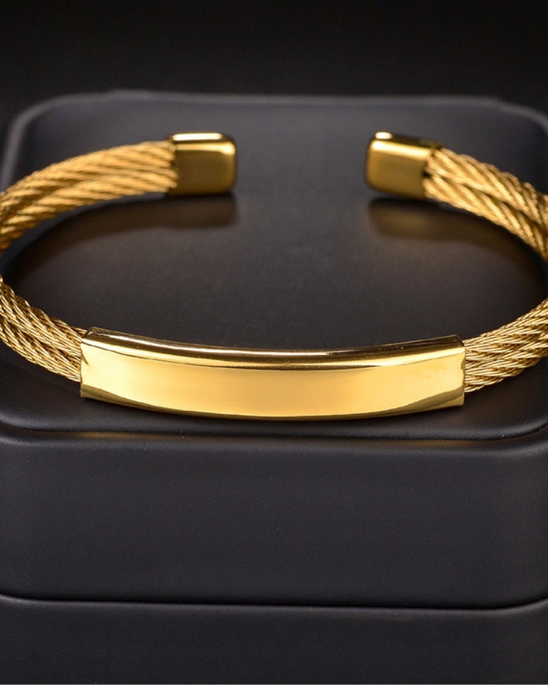 Bold Industrial Torque Cable Cuff Bracelet - Polished Gold-Tone Twisted Steel Style