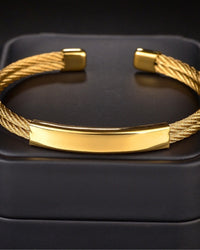 Bold Industrial Torque Cable Cuff Bracelet - Polished Gold-Tone Twisted Steel Style