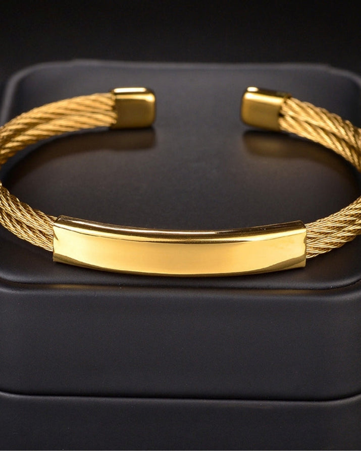 Bold Industrial Torque Cable Cuff Bracelet - Polished Gold-Tone Twisted Steel Style
