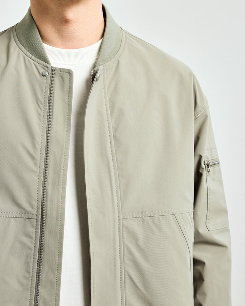 Men's Sleek Minimalist Bomber Jacket: Collarless, Zip-Front, Utility Pocket