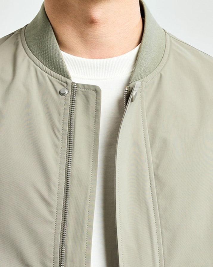 Men's Sleek Minimalist Bomber Jacket: Collarless, Zip-Front, Utility Pocket