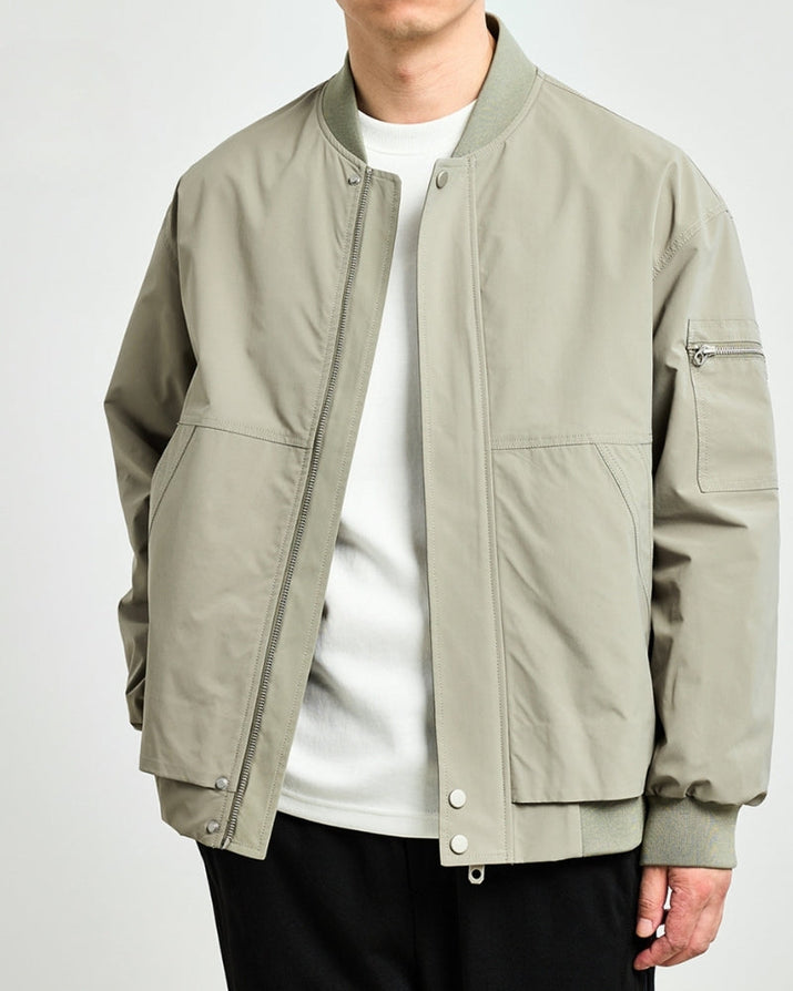 Men's Sleek Minimalist Bomber Jacket: Collarless, Zip-Front, Utility Pocket